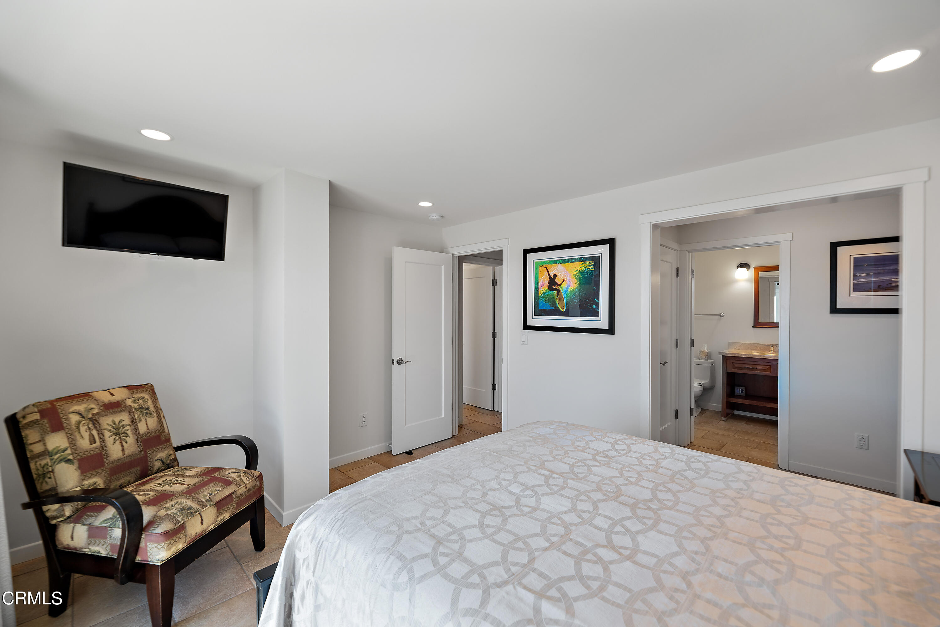 2013 Ocean Drive Oxnard, CA 93035 - Photo 52 of 60 a bedroom with a bed and a couch