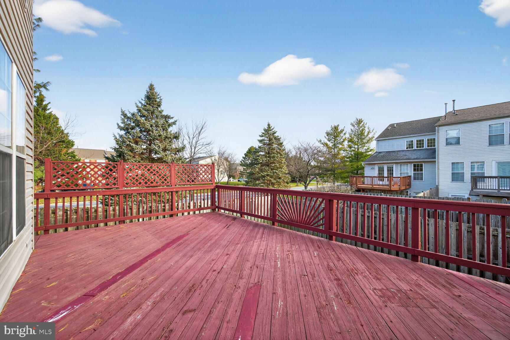 6715 Manorly Court Frederick, MD 21703 - Photo 14 of 15 a view of a balcony with wooden floor