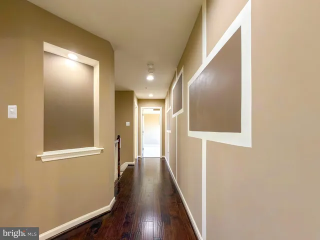a view of a bathroom with a tub shower and sink