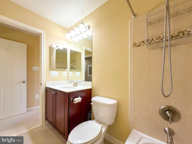 a view of a bathroom from a hallway