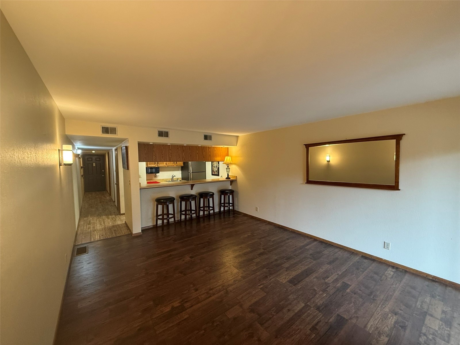 500 Bills Ranch Road, Unit C111 Frisco, CO 80443 - Photo 1 of 33 a view of a livingroom with wooden floor and a flat screen tv