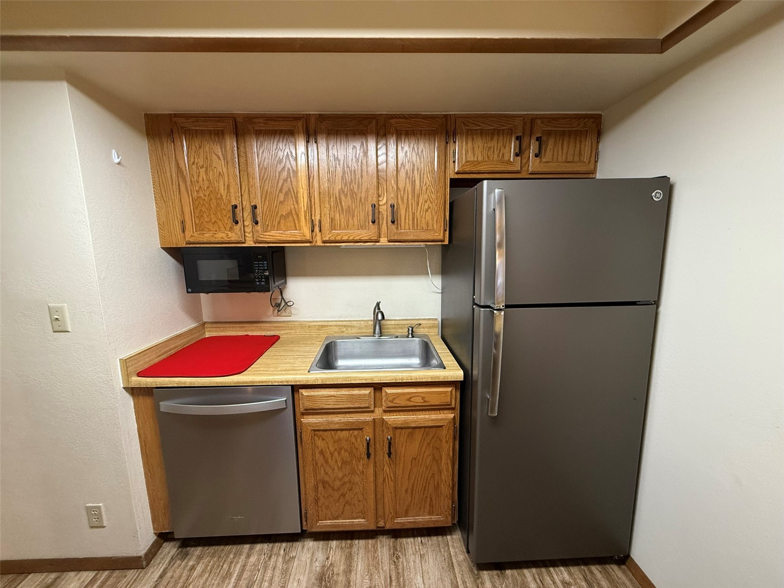 500 Bills Ranch Road, Unit C111 Frisco, CO 80443 - Photo 8 of 33 a kitchen with a refrigerator sink and cabinets