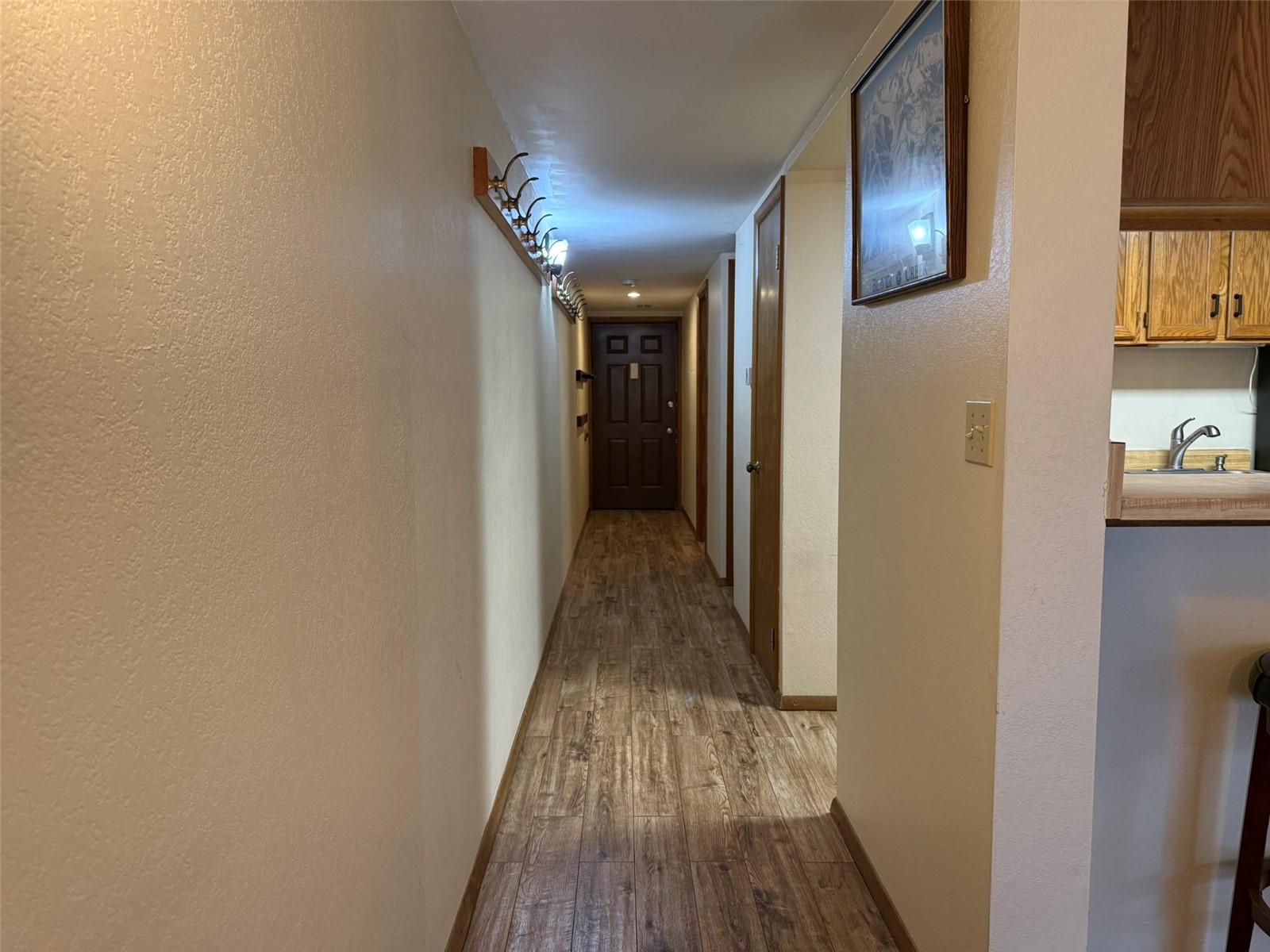 500 Bills Ranch Road, Unit C111 Frisco, CO 80443 - Photo 10 of 33 a view of a hallway view with wooden floor and staircase