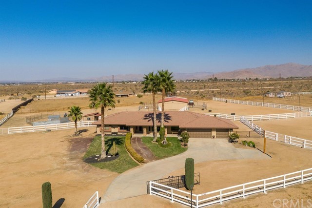 22332 Poppy Road Apple Valley, CA 92308 - Photo 1 of 1 a view of a swimming pool with an ocean