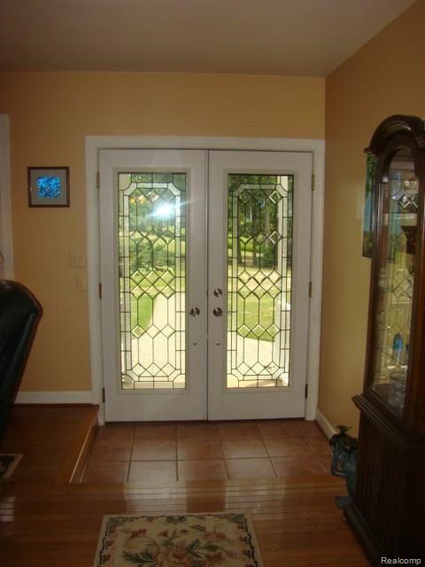 4214 Stanley Road Columbiaville, MI 48421 - Photo 10 of 46 interior_view_front_door_leaded_glass.jpg