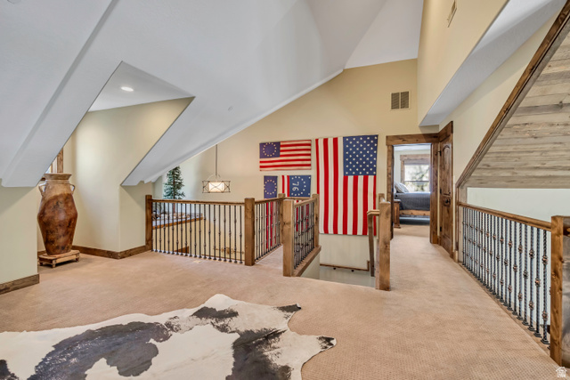 9049 Timphaven Road Sundance, UT 84604 - Photo 25 of 63 Bonus room featuring light colored carpet, recessed lighting, and lofted ceiling