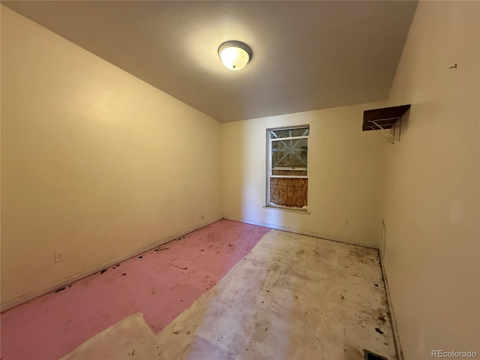 577 Fdr 101 Road Antonito, CO 81120 - Photo 18 of 40 an empty room with windows