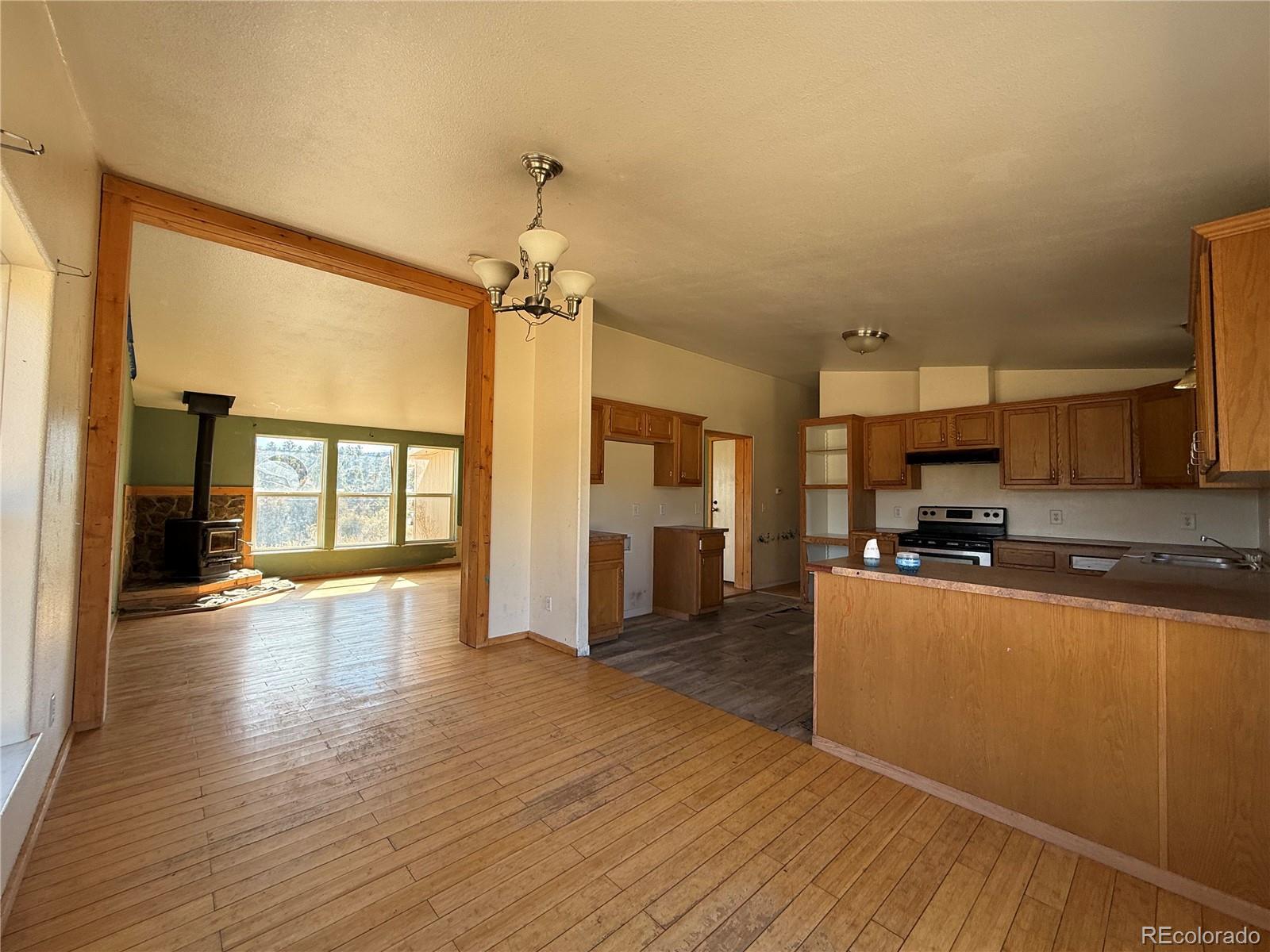 577 Fdr 101 Road Antonito, CO 81120 - Photo 26 of 40 a kitchen with stainless steel appliances a refrigerator and a stove top oven
