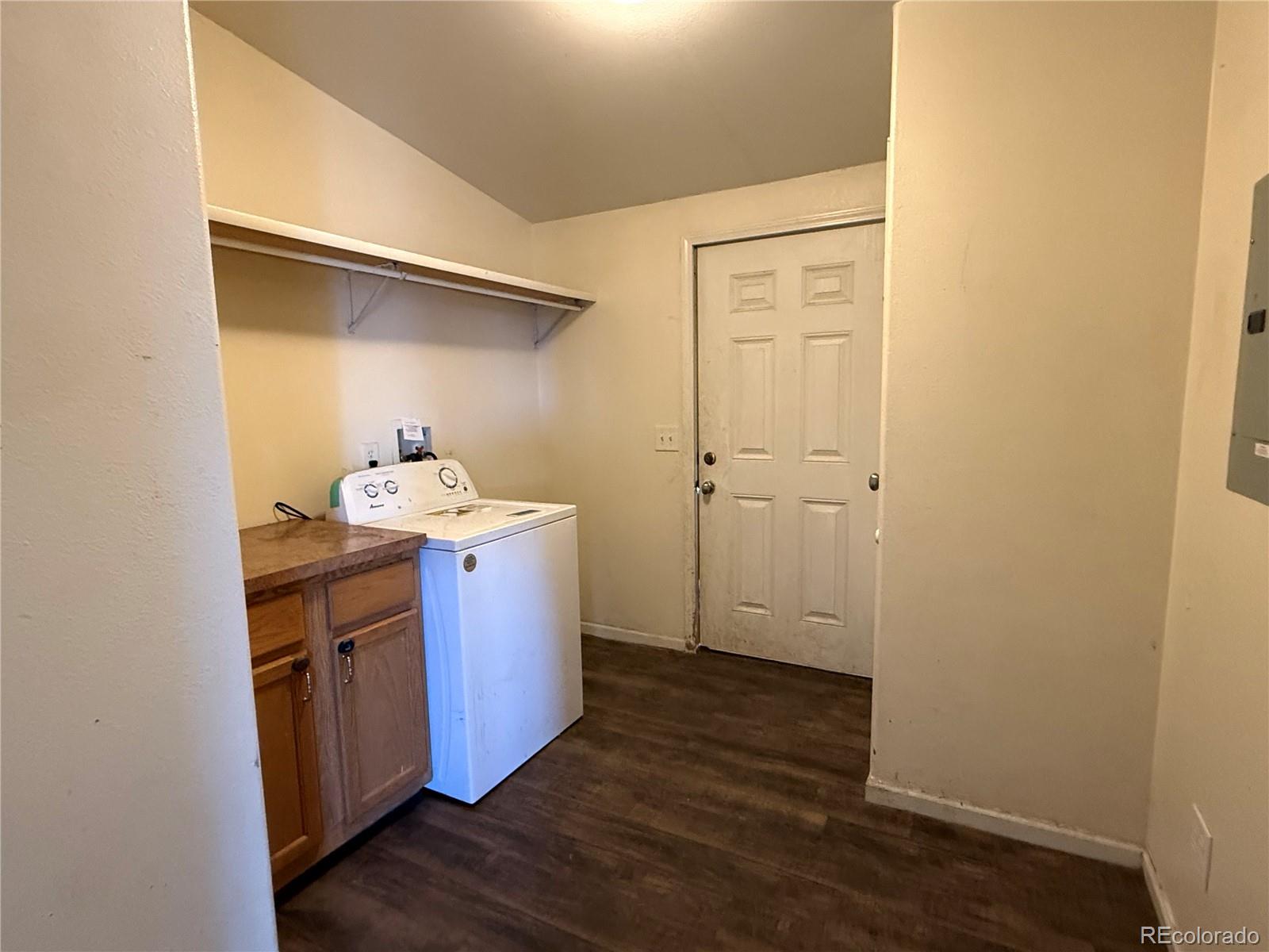 577 Fdr 101 Road Antonito, CO 81120 - Photo 27 of 40 a kitchen with a sink and wooden floor