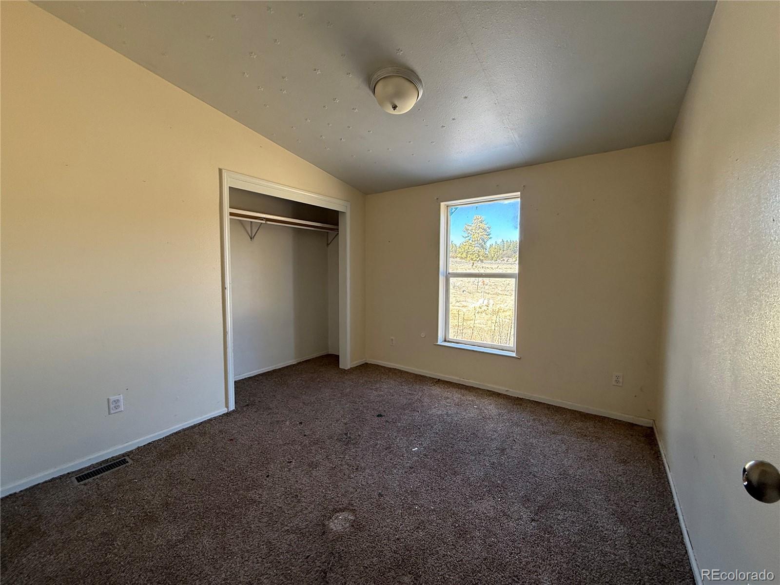 577 Fdr 101 Road Antonito, CO 81120 - Photo 29 of 40 an empty room with windows