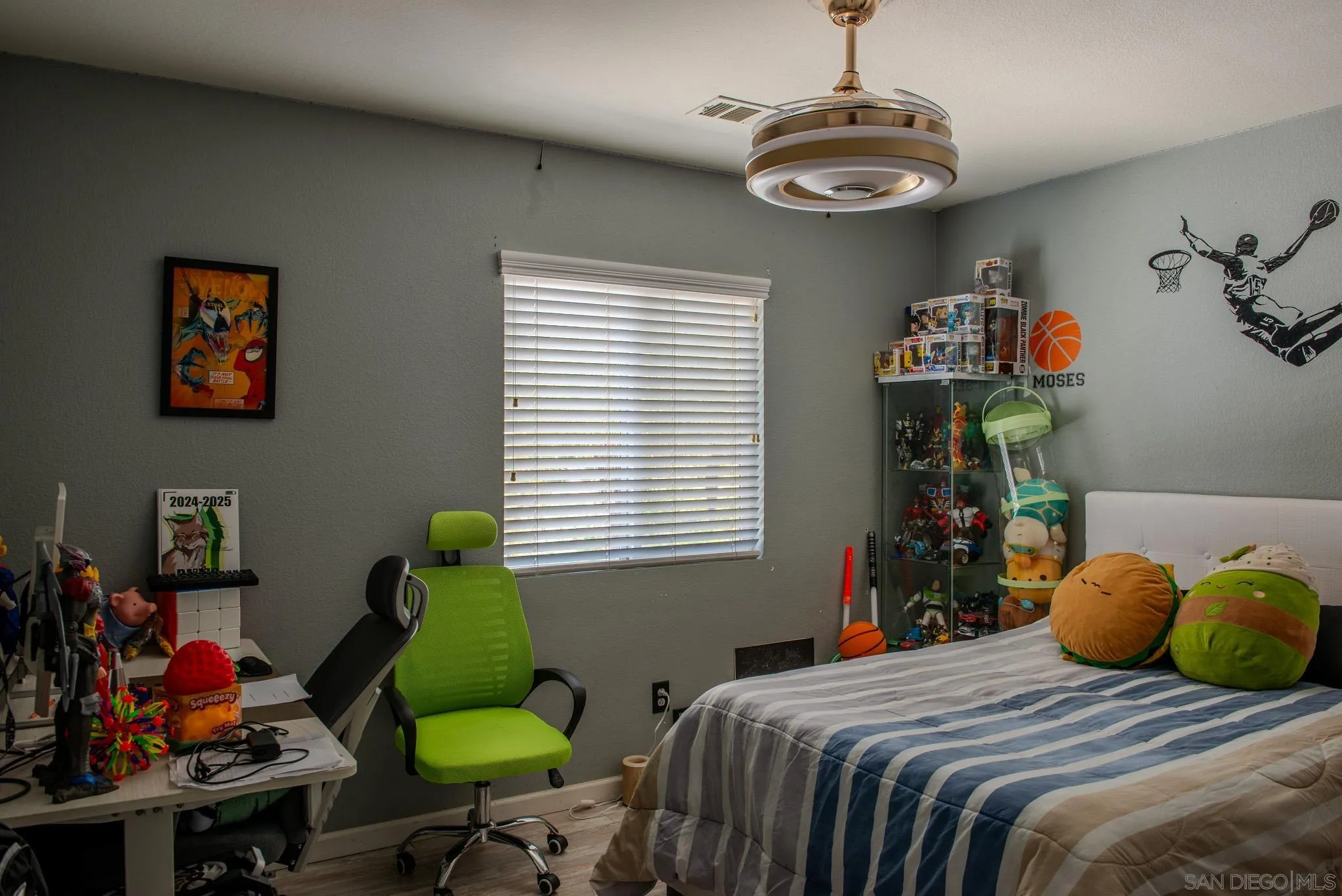 33567 Magnetite Street Menifee, CA 92584 - Photo 26 of 49 a bedroom with bed and a window