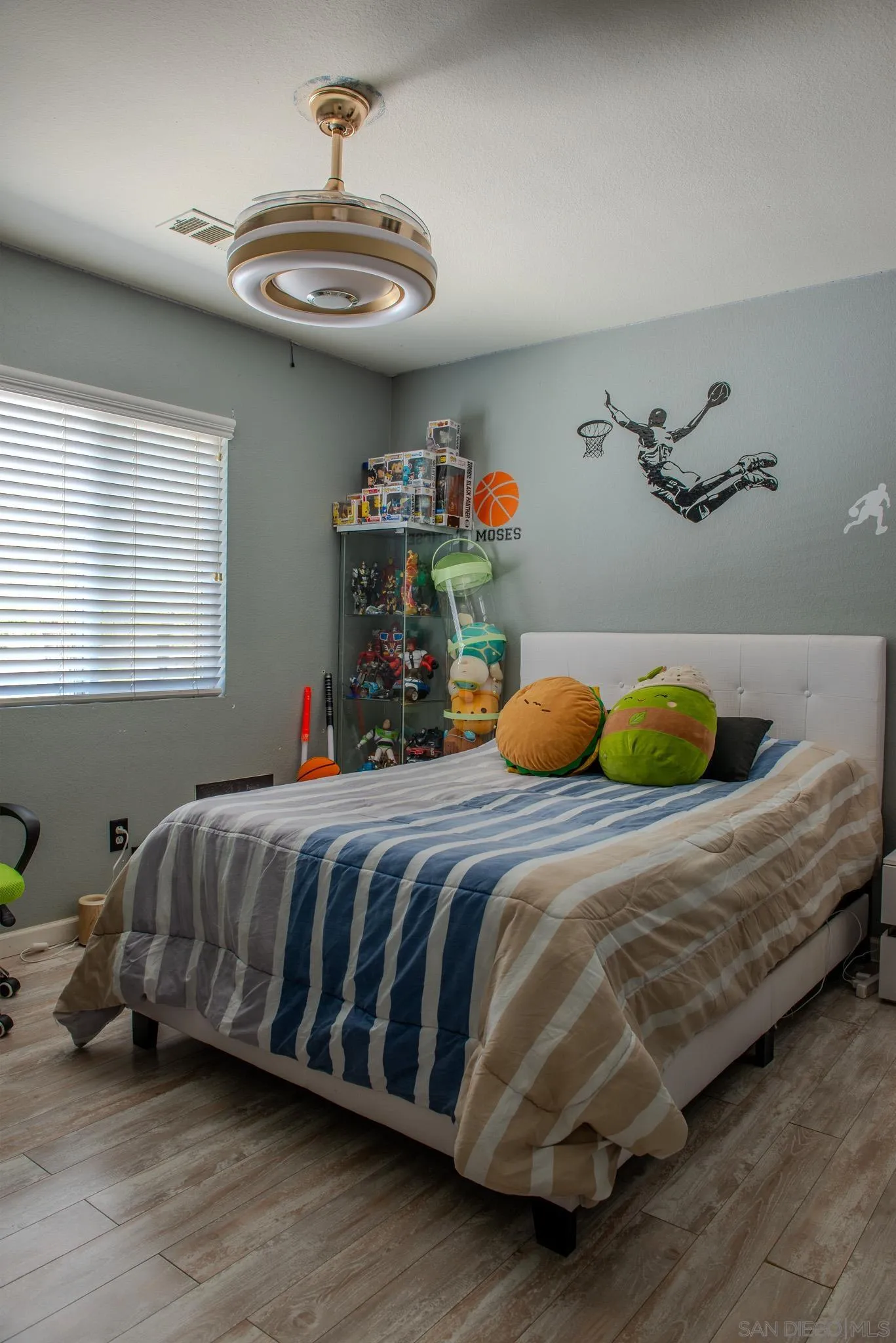33567 Magnetite Street Menifee, CA 92584 - Photo 27 of 49 a bedroom with a bed and window