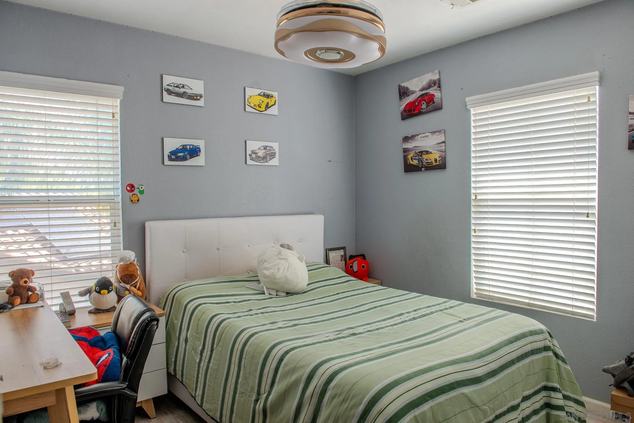 33567 Magnetite Street Menifee, CA 92584 - Photo 28 of 49 a bedroom with a bed and a window
