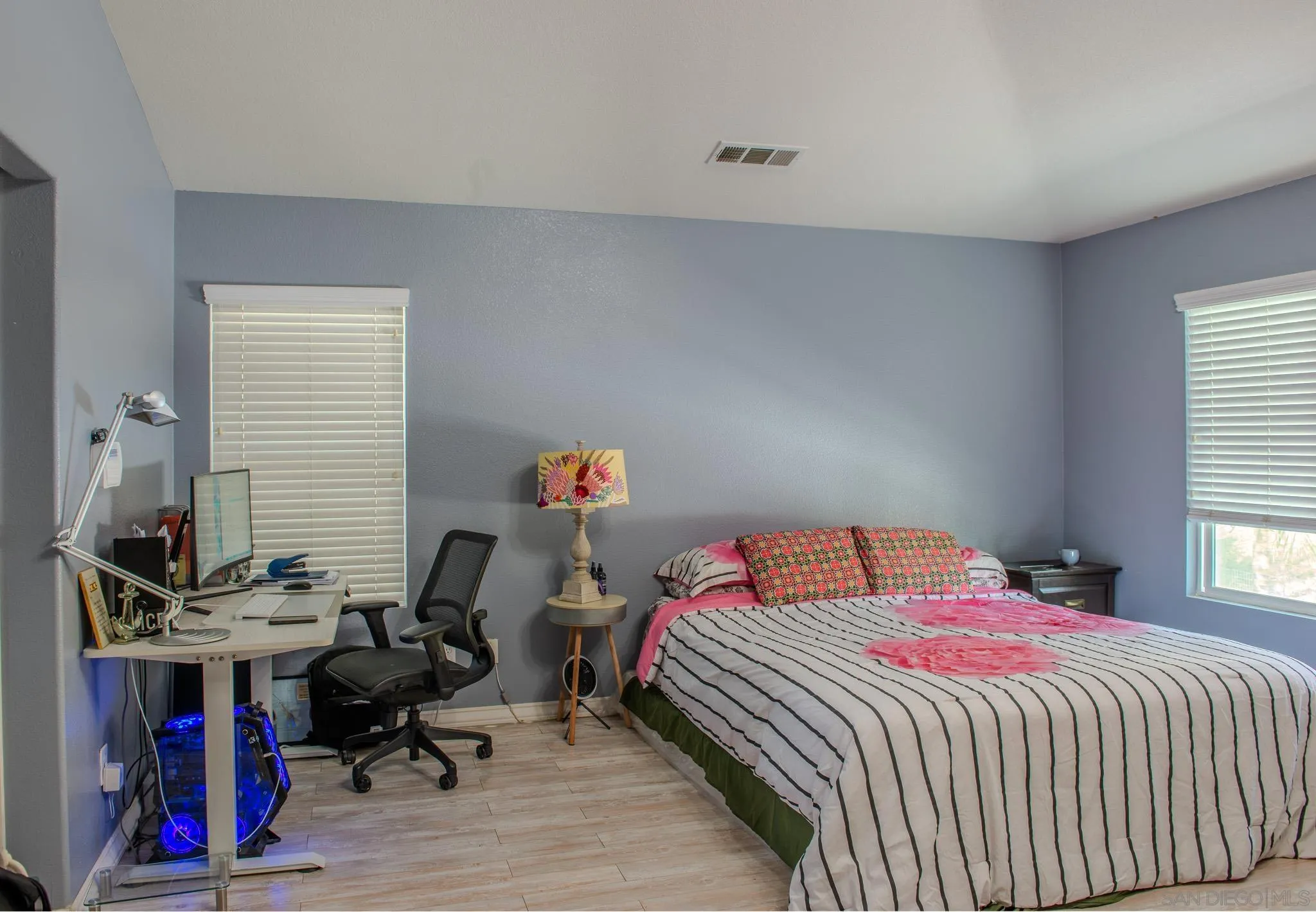 33567 Magnetite Street Menifee, CA 92584 - Photo 33 of 49 a bedroom with a bed and a desk