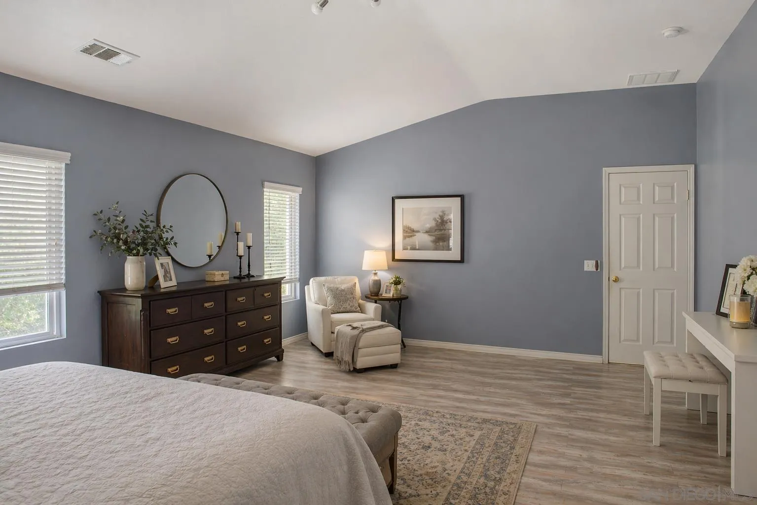 33567 Magnetite Street Menifee, CA 92584 - Photo 34 of 49 a bedroom with a bed and a dresser