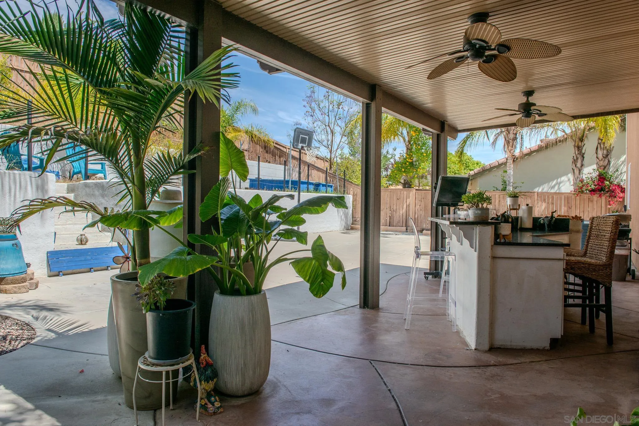 33567 Magnetite Street Menifee, CA 92584 - Photo 44 of 49 a potted plant sitting in front of a building