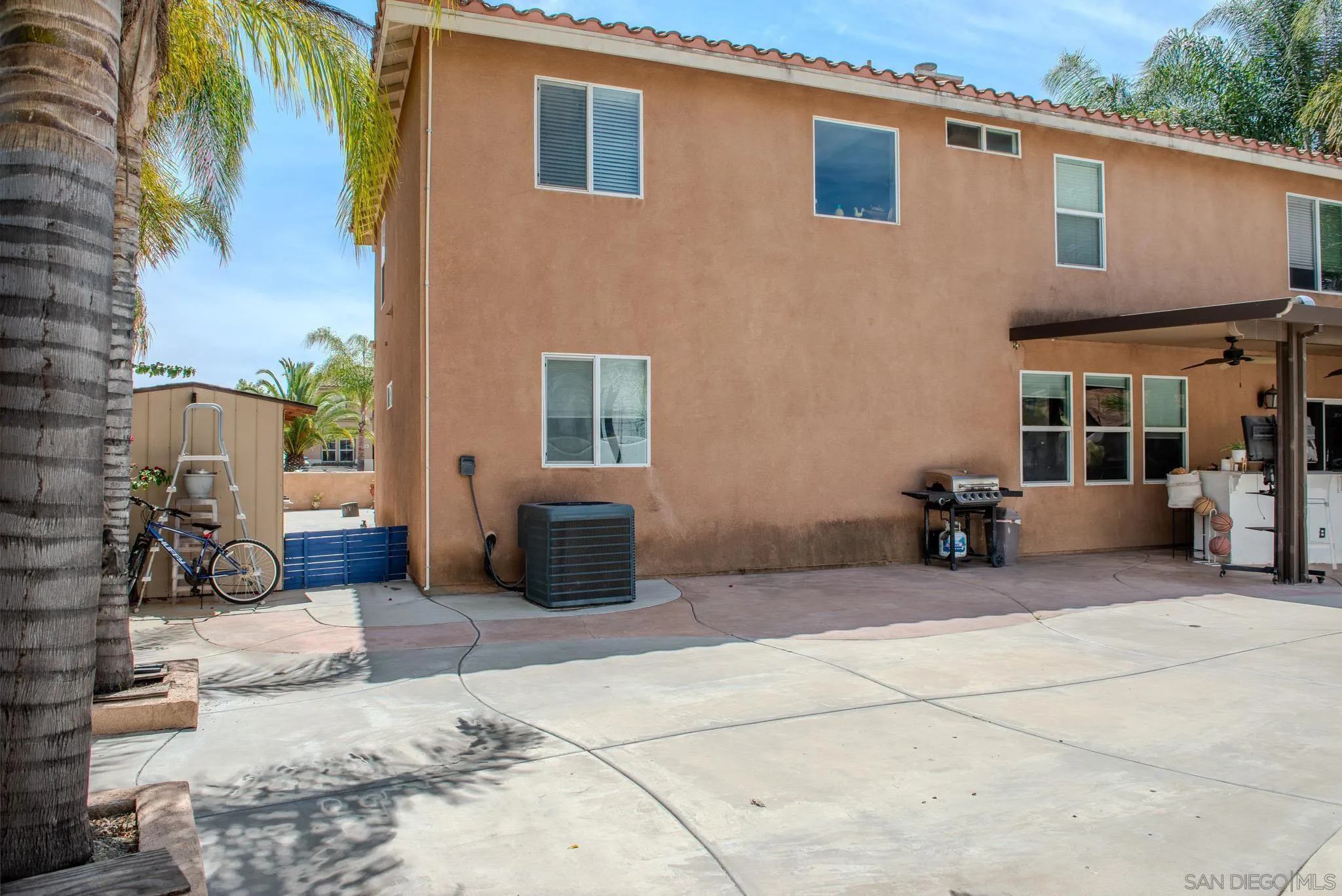 33567 Magnetite Street Menifee, CA 92584 - Photo 46 of 49 a view of a house with couches in front of house