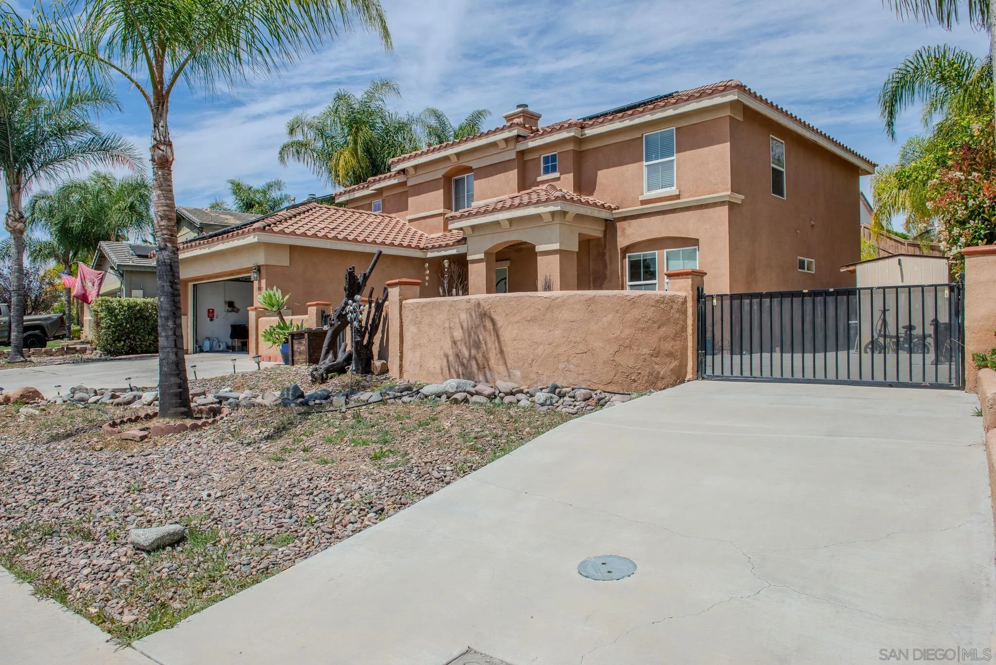 33567 Magnetite Street Menifee, CA 92584 - Photo 5 of 49 a front view of a house with a yard