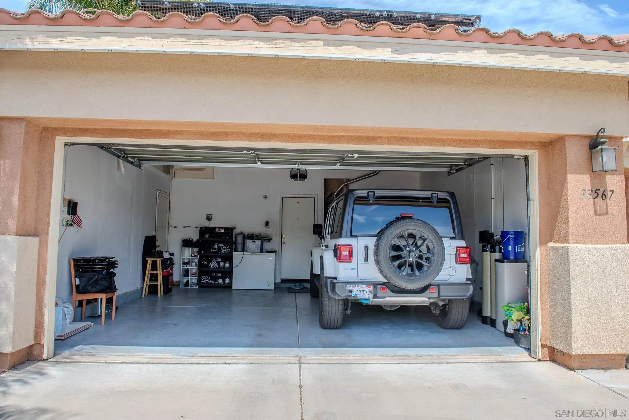 33567 Magnetite Street Menifee, CA 92584 - Photo 6 of 49 a utility room with a stove and cabinets