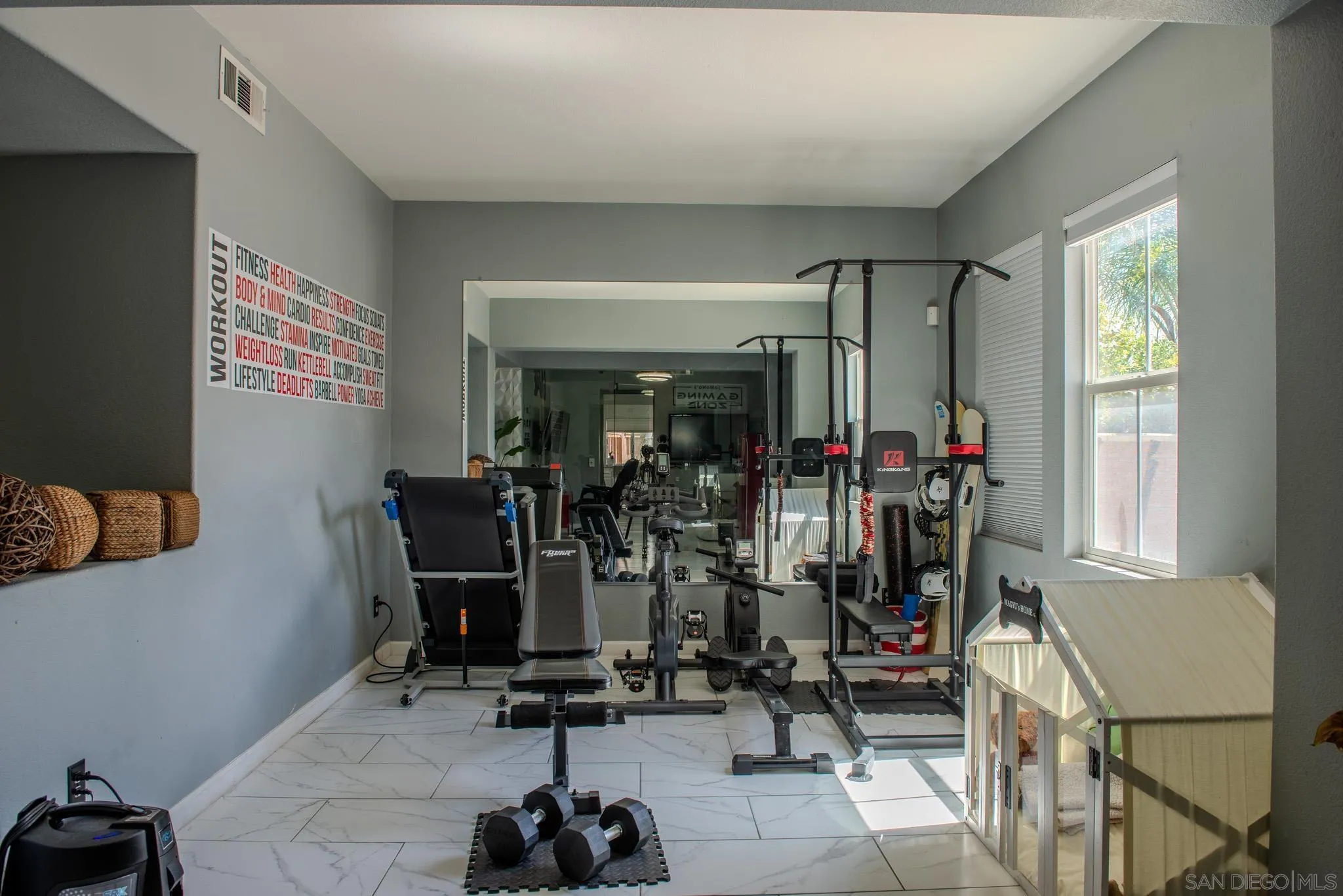 33567 Magnetite Street Menifee, CA 92584 - Photo 10 of 49 a view of a room with gym equipment