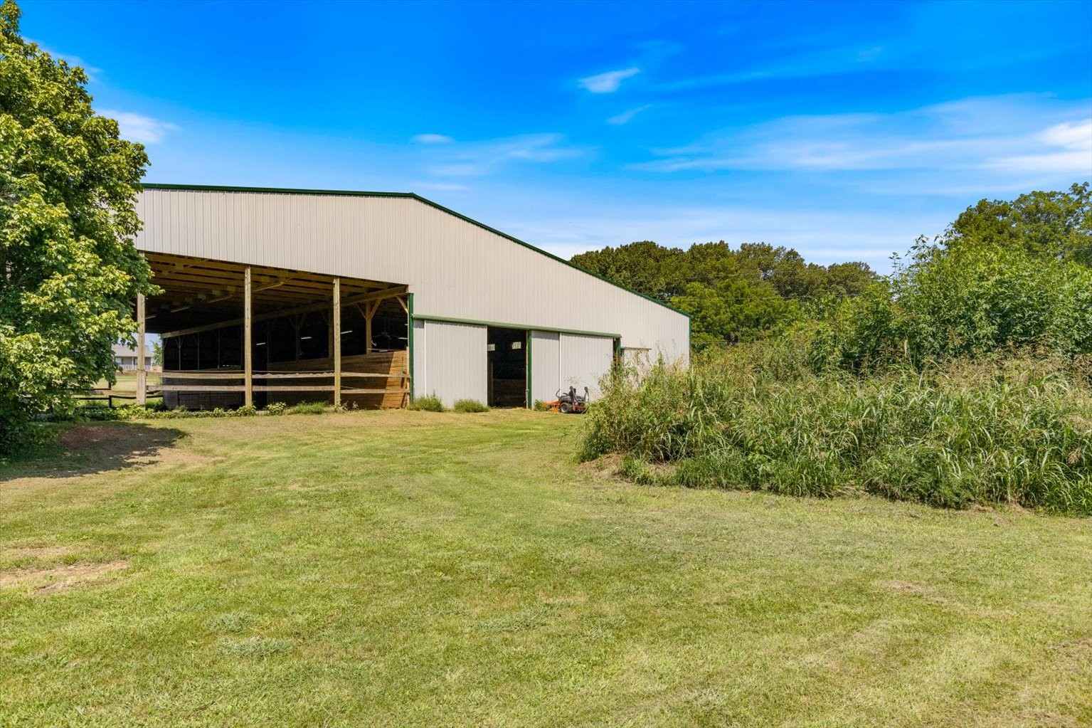 399 Jernigan Road Portland, TN 37148 - Photo 13 of 40 a view of a house with backyard and garden