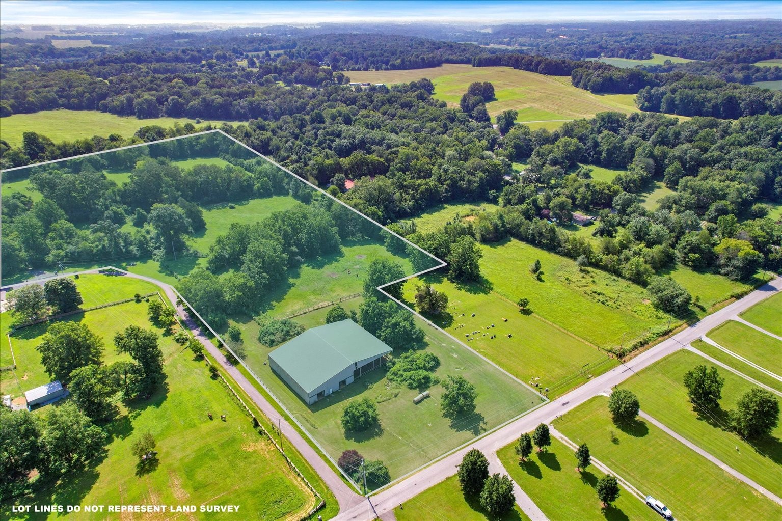 399 Jernigan Road Portland, TN 37148 - Photo 28 of 40 an aerial view of a residential houses with outdoor space and a lake view