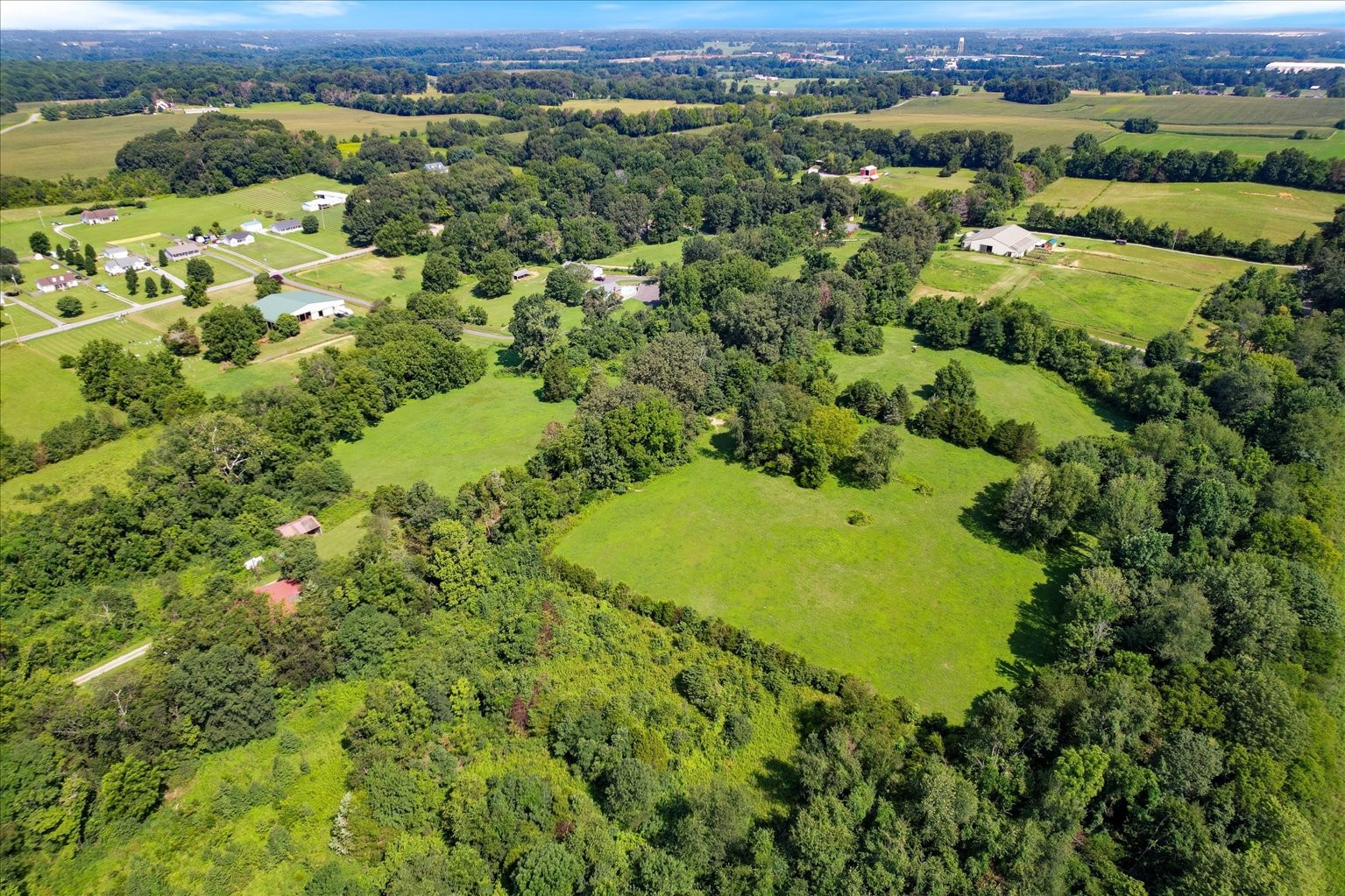 399 Jernigan Road Portland, TN 37148 - Photo 36 of 40 an aerial view of a houses with a lush green hillside