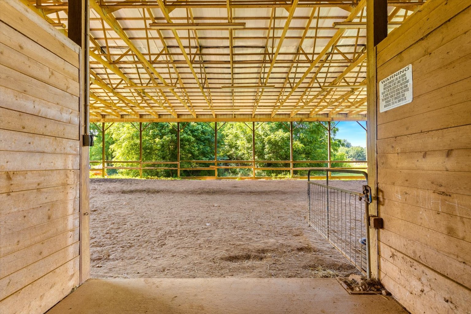 399 Jernigan Road Portland, TN 37148 - Photo 8 of 40 a view of a porch with a floor to ceiling window