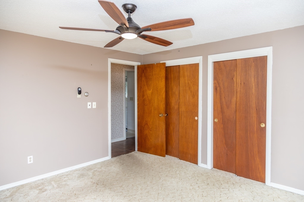 67 Hillside Road Montague, MA 01351 - Photo 13 of 26 a view of a livingroom with a ceiling fan