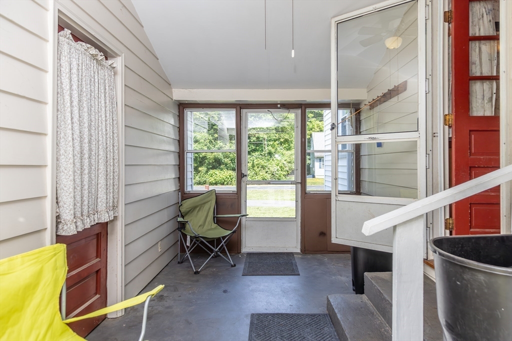 67 Hillside Road Montague, MA 01351 - Photo 19 of 26 a view of balcony with furniture and a window