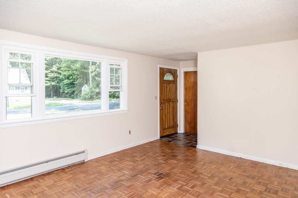 67 Hillside Road Montague, MA 01351 - Photo 3 of 26 an empty room with windows