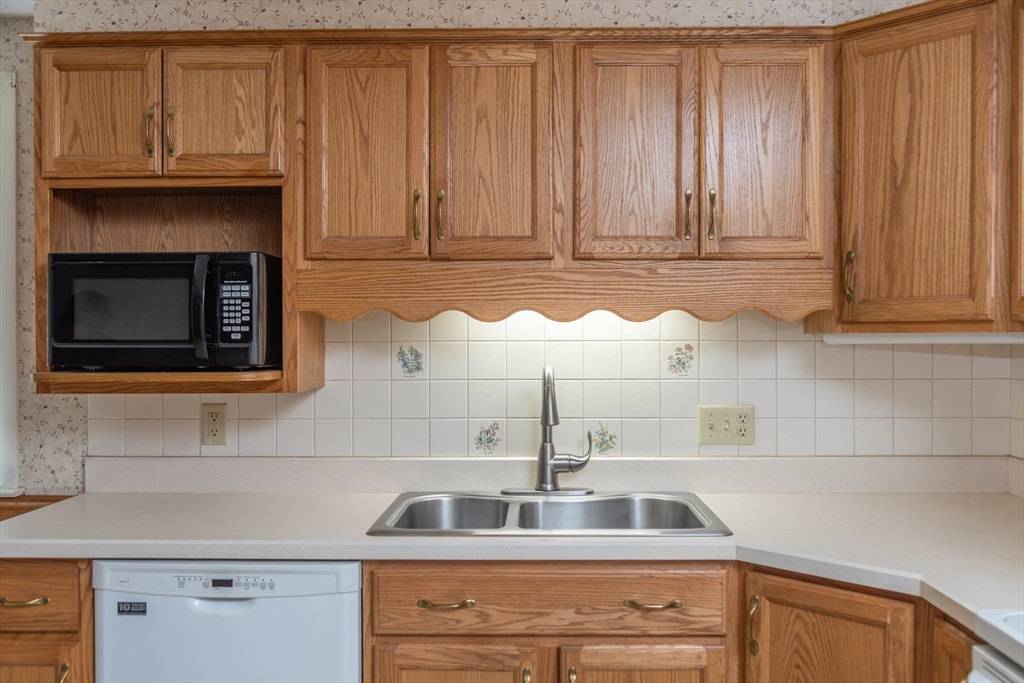 67 Hillside Road Montague, MA 01351 - Photo 8 of 26 a kitchen with a sink and cabinets