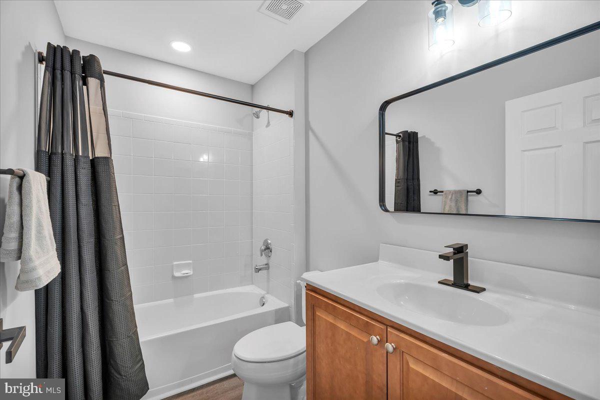 35 Beaumont Place Westampton, NJ 08060 - Photo 18 of 21 a bathroom with a sink a toilet a mirror and shower