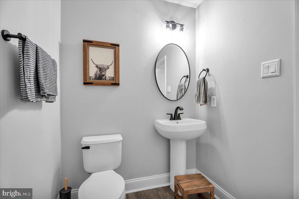 35 Beaumont Place Westampton, NJ 08060 - Photo 19 of 21 a bathroom with a toilet a sink and a mirror