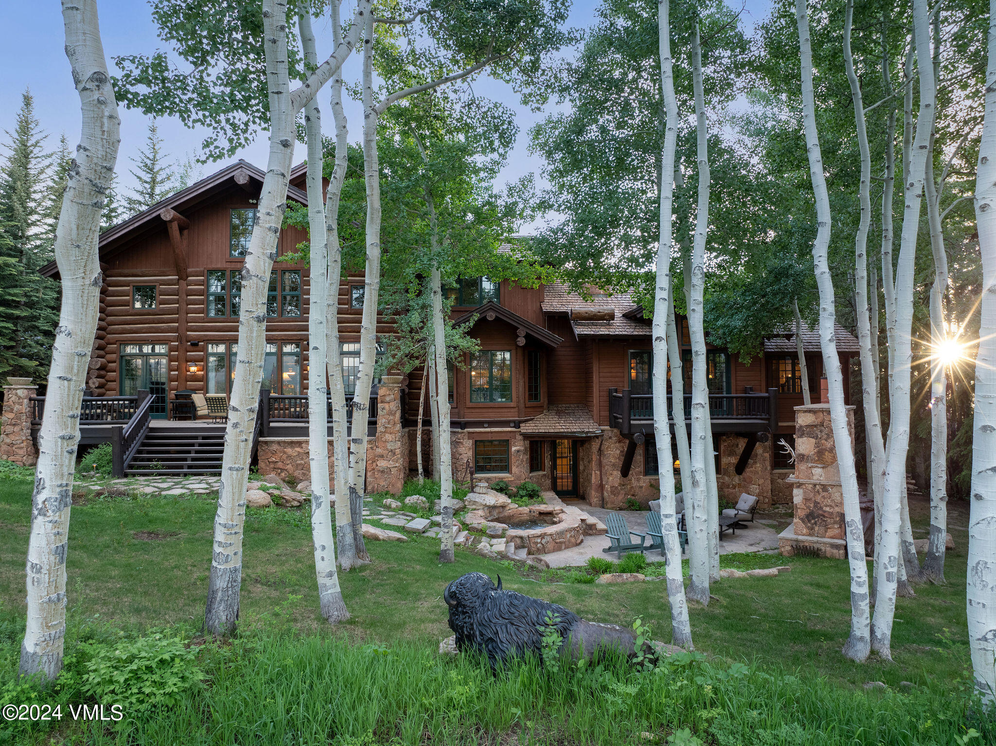 2187 Daybreak Ridge Road Avon, CO 81620 - Photo 2 of 40 a view of a house with backyard and porch