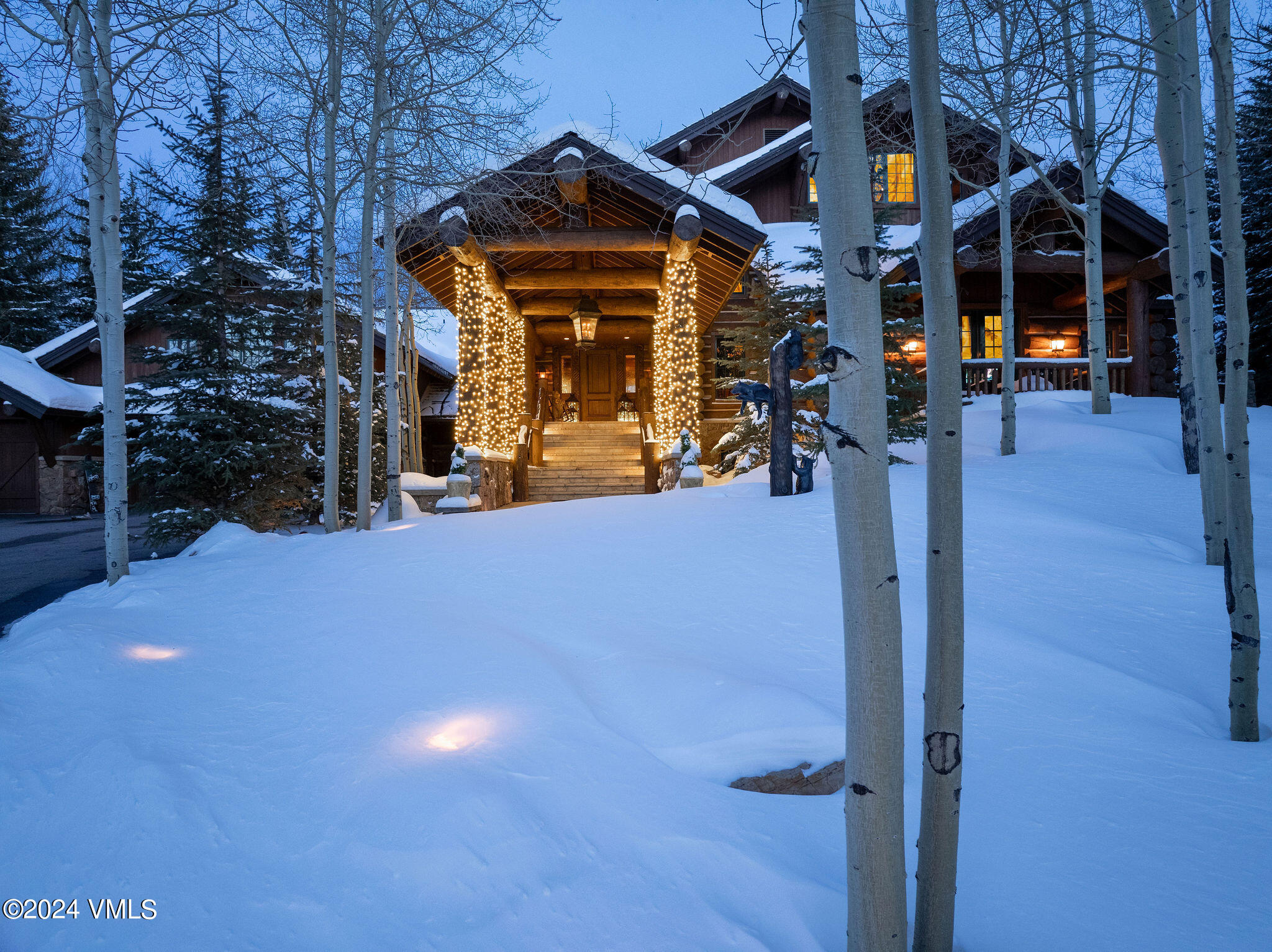 2187 Daybreak Ridge Road Avon, CO 81620 - Photo 36 of 40 a view of a building with a tree