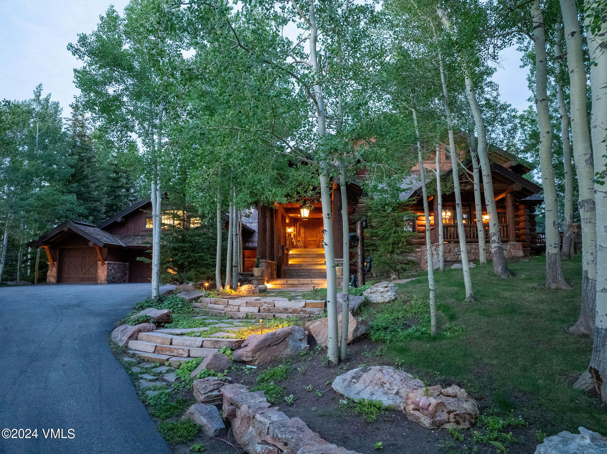 2187 Daybreak Ridge Road Avon, CO 81620 - Photo 39 of 40 a view of a house with backyard and garden