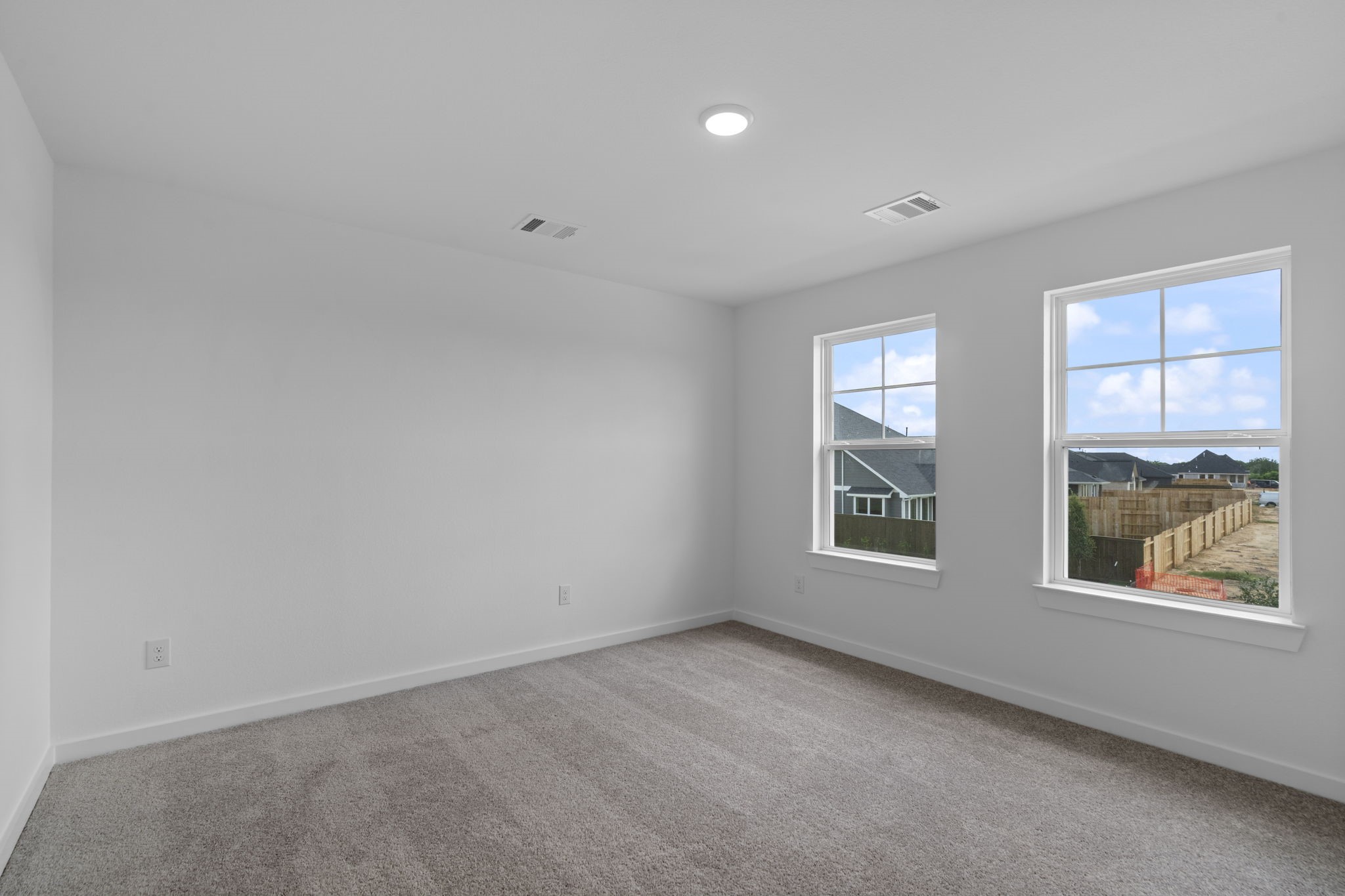 225 Sandhill Grv Trail Hempstead, TX 77445 - Photo 14 of 27 an empty room with windows