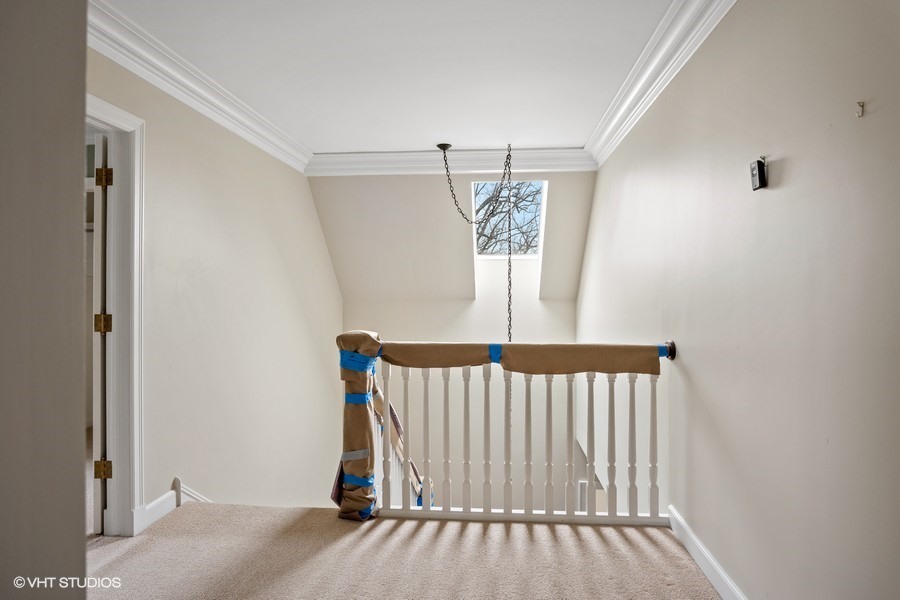 889 Sheridan Road Winnetka, IL 60093 - Photo 13 of 37 a view of entryway with stairs and a window