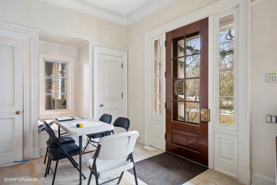 889 Sheridan Road Winnetka, IL 60093 - Photo 18 of 37 a view of a dining room with furniture and window
