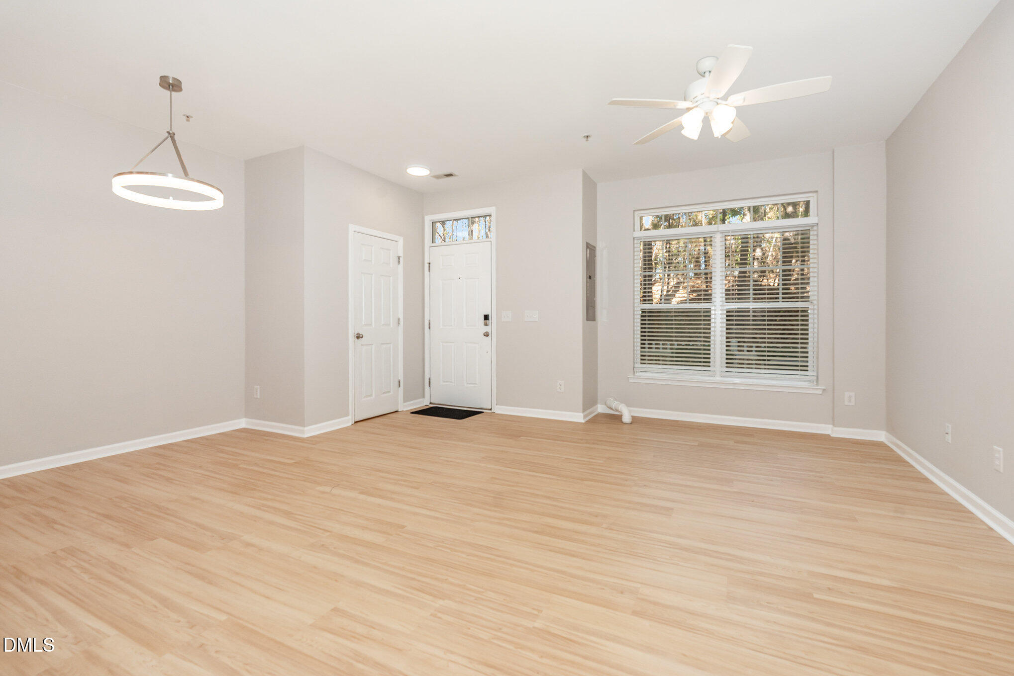 311 Gilman Lane, Unit 107 Raleigh, NC 27610 - Photo 4 of 21 a view of an empty room with a window