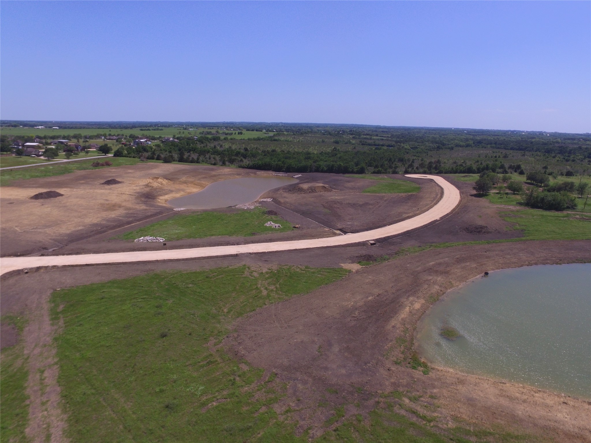 Lot 1 Jozwiak Road Chappell Hill, TX 77426 - Photo 7 of 9 a view of a lake with a city