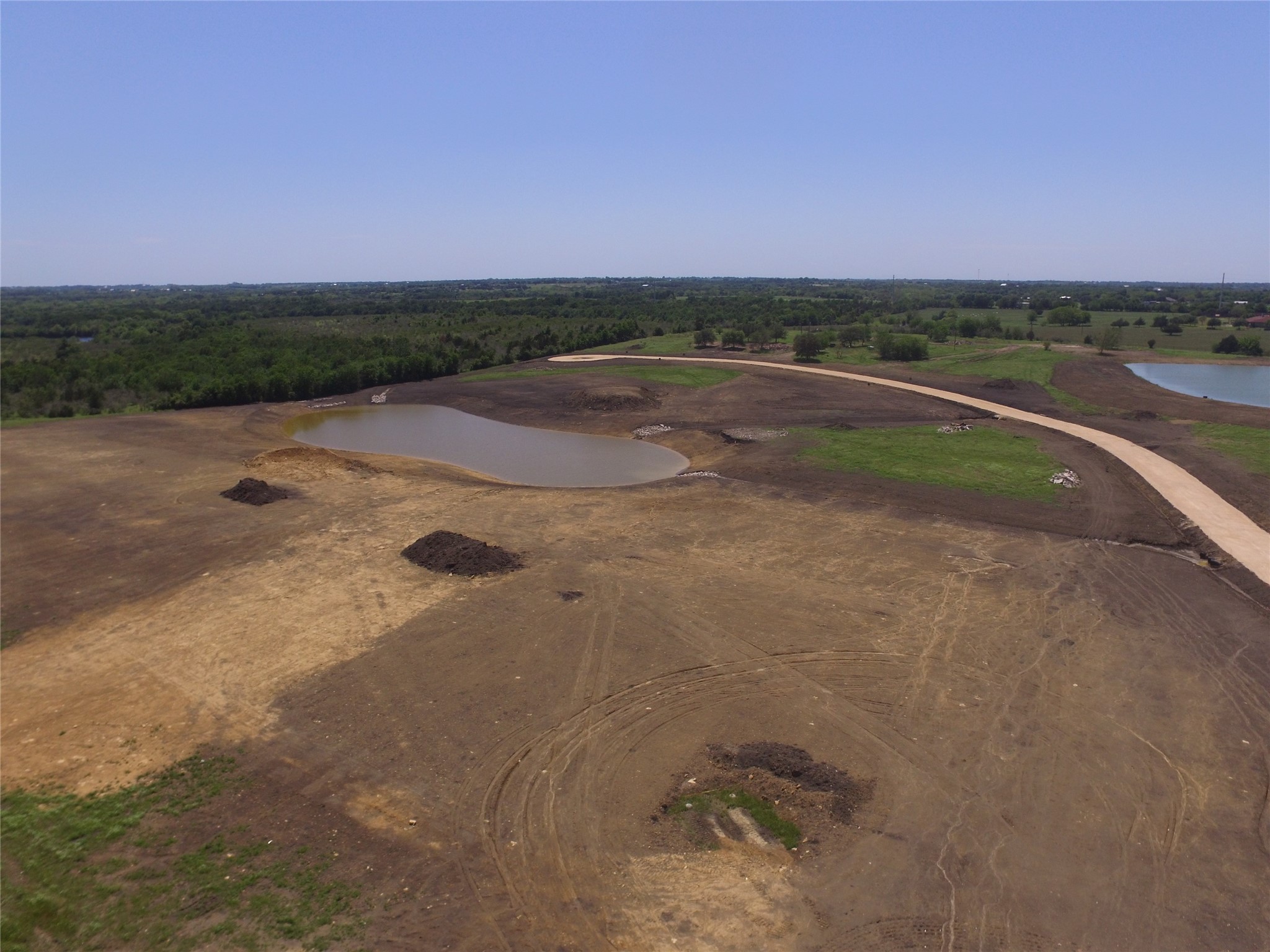 Lot 1 Jozwiak Road Chappell Hill, TX 77426 - Photo 8 of 9 a view of a lake with outdoor space
