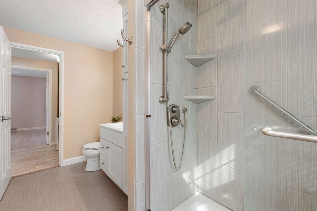 20 Hemlock Circle, Unit 20 Millis, MA 02054 - Photo 16 of 27 a bathroom with a shower a toilet and a sink
