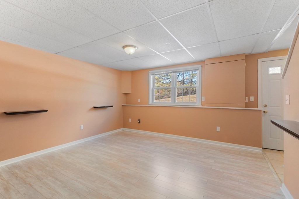 20 Hemlock Circle, Unit 20 Millis, MA 02054 - Photo 20 of 27 an empty room with windows and refrigerator
