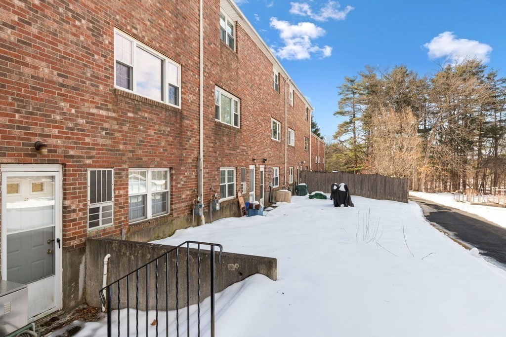 20 Hemlock Circle, Unit 20 Millis, MA 02054 - Photo 21 of 27 a view of a house with backyard and sitting area