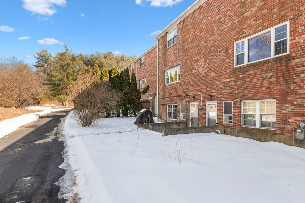20 Hemlock Circle, Unit 20 Millis, MA 02054 - Photo 22 of 27 a view of a street with a building in the background