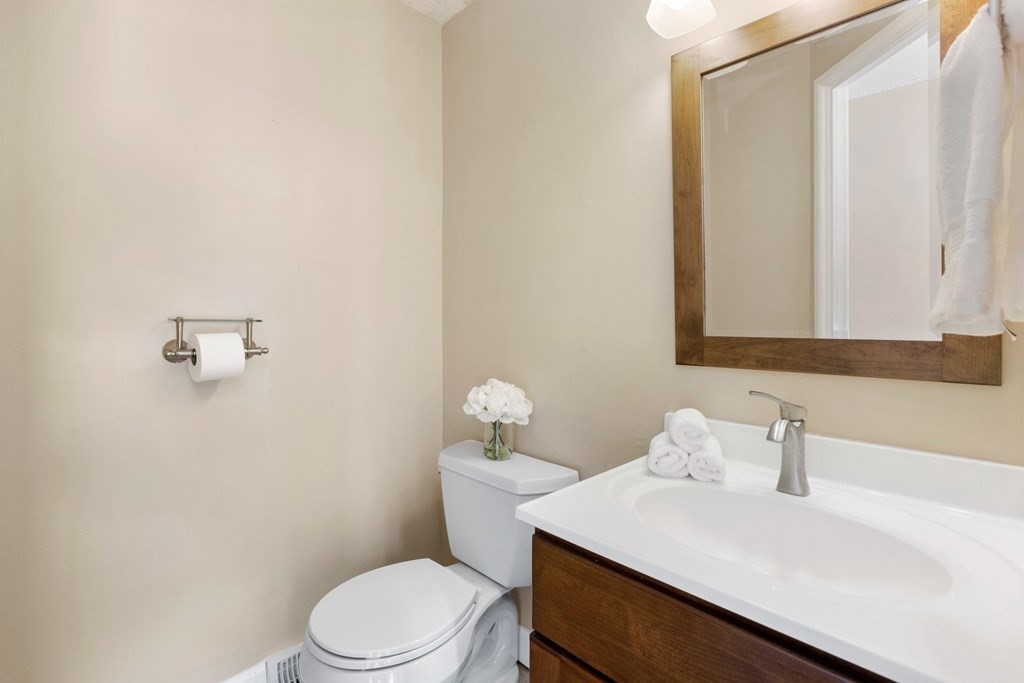 20 Hemlock Circle, Unit 20 Millis, MA 02054 - Photo 9 of 27 a bathroom with a sink a toilet and mirror