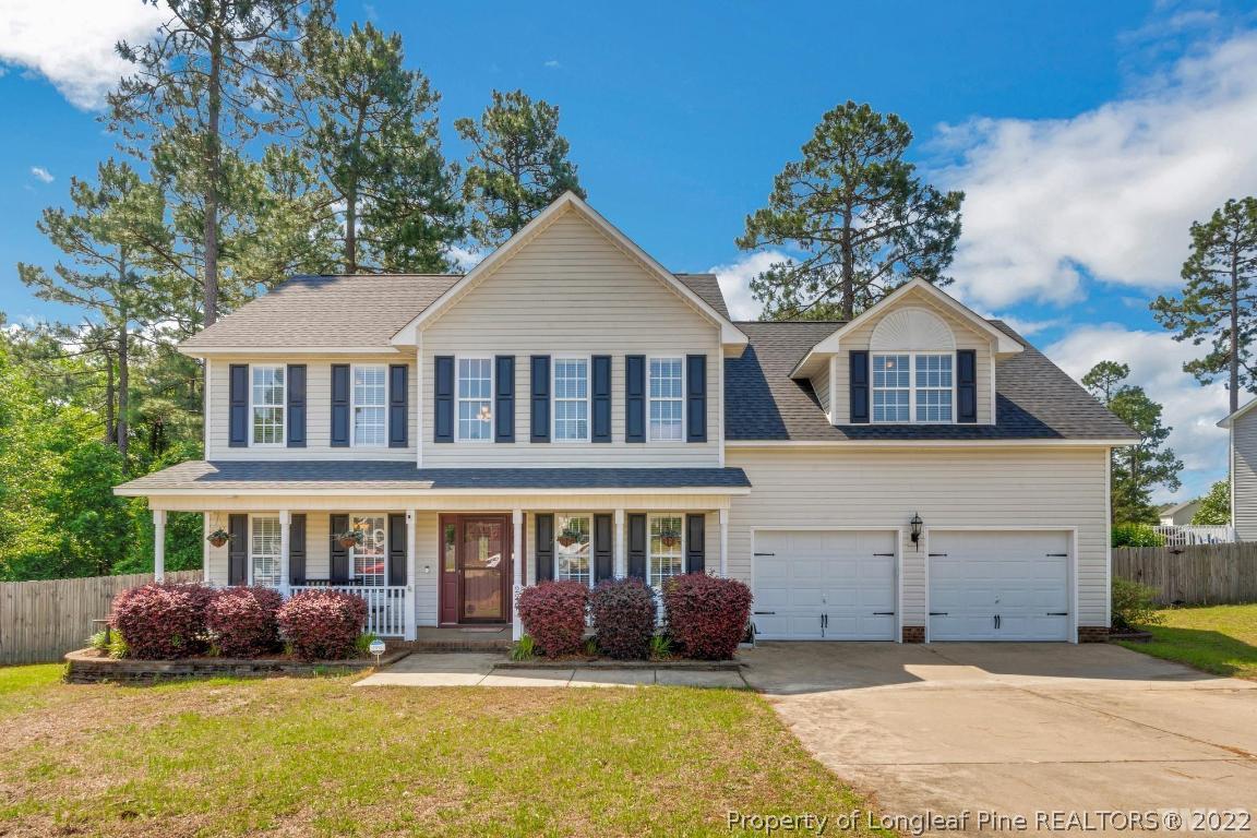 226 Linden Road Cameron, NC 28326 - Photo 1 of 36 a front view of a house with a yard and outdoor seating