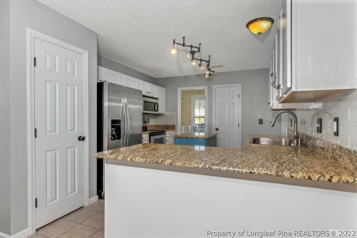 226 Linden Road Cameron, NC 28326 - Photo 12 of 36 a view of a kitchen and a sink